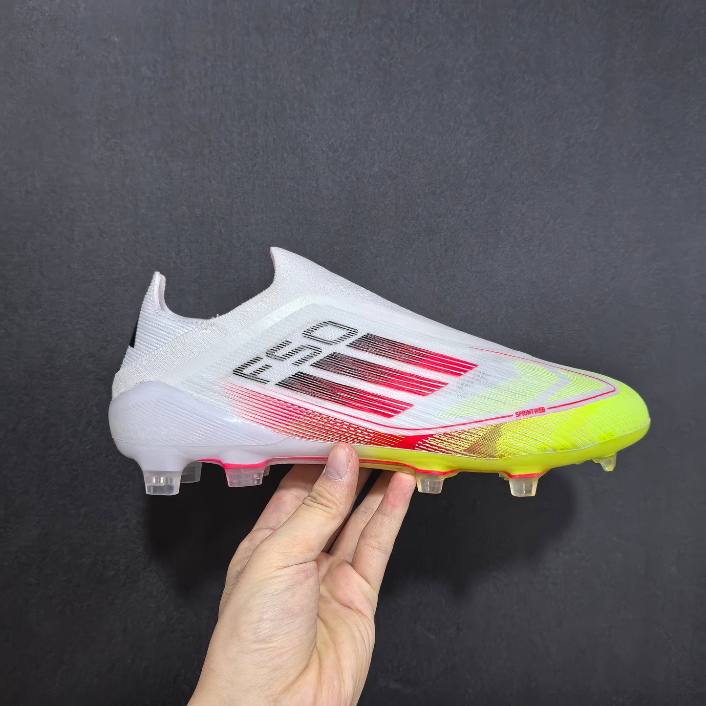 F50 ELITE FG WHITE/RED/YELLOW